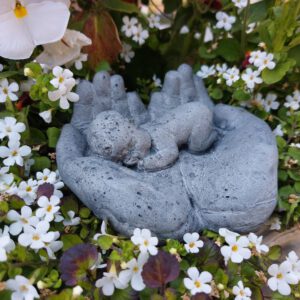 Baby in handen